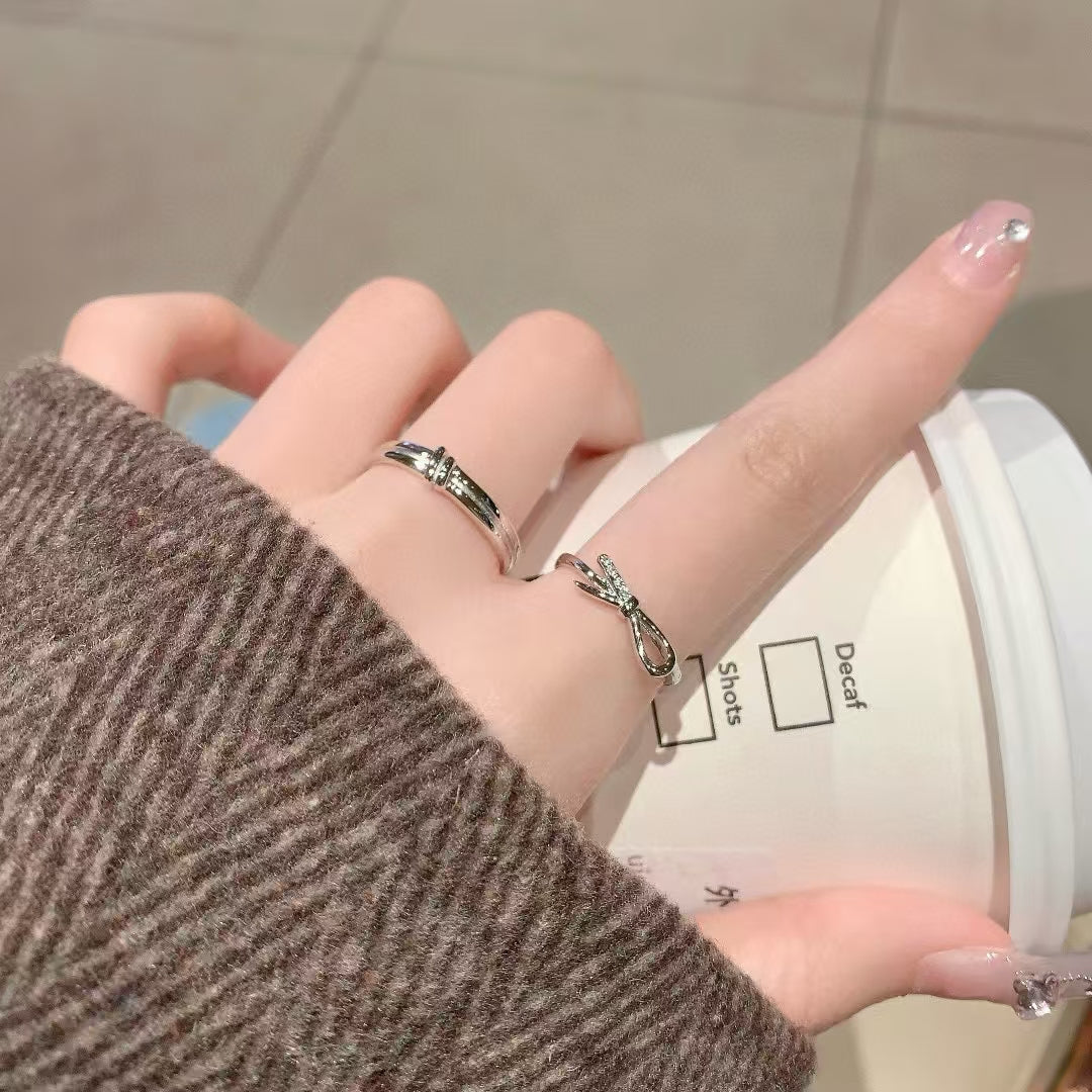 Tied with Devotion: Artisan Sterling Silver Bow Couple Rings with Sparkling CZ 2 pieces
