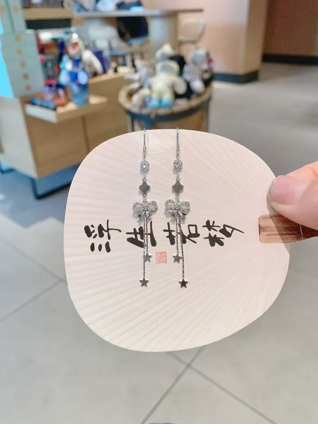 Boucles d'oreilles nœud enchanté en argent sterling 925 : une féminité intemporelle avec une touche scintillante