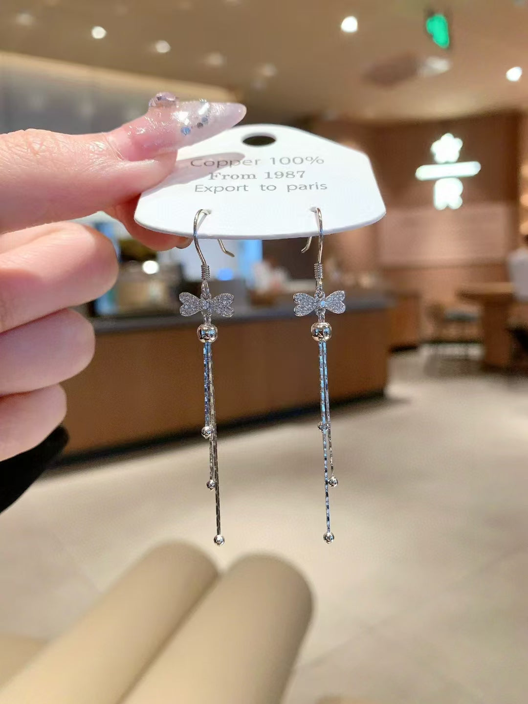 Boucles d'oreilles artisanales en argent sterling 925 avec nœud et pampille et zircone – L'élégance en mouvement