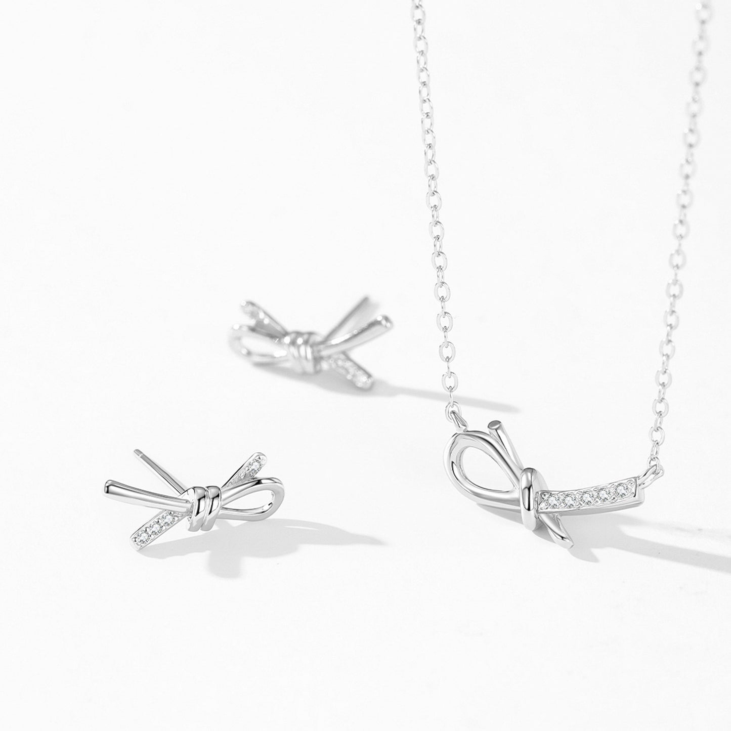 Enchanting Bow Jewelry Set - Zircon Sterling Silver Earrings & Necklace