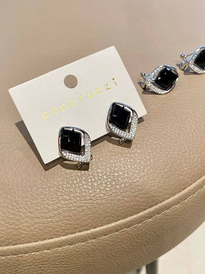 Boucles d'oreilles à tige en argent éblouissantes œil de chat noir et zircon