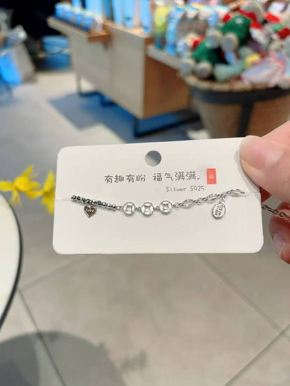 Bracelet de richesse impériale : cinq pièces impériales pour la fortune et la protection