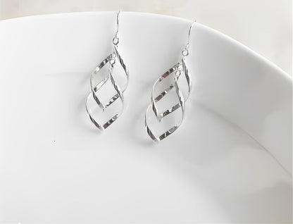 Boucles d'oreilles à tige en argent fin 990 fabriquées à la main — Élégance intemporelle, fabrication artisanale