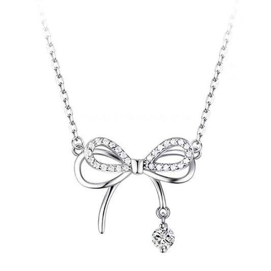 Collier nœud étincelant fabriqué à la main : l'élégance intemporelle rencontre la fantaisie moderne