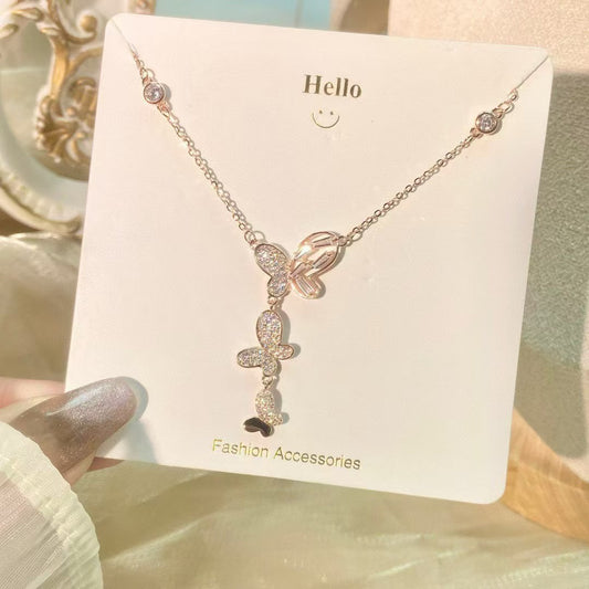 Collier pendentif papillon en argent sterling et oxyde de zirconium fabriqué à la main Trio d'ailes