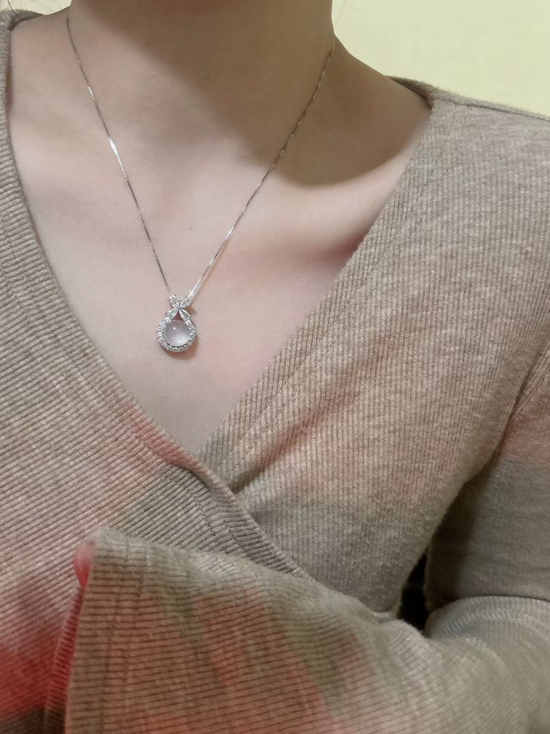 Handcrafted Sterling Silver Bow Pendant Necklace Featuring Zirconia & White Chalcedony Gemstone