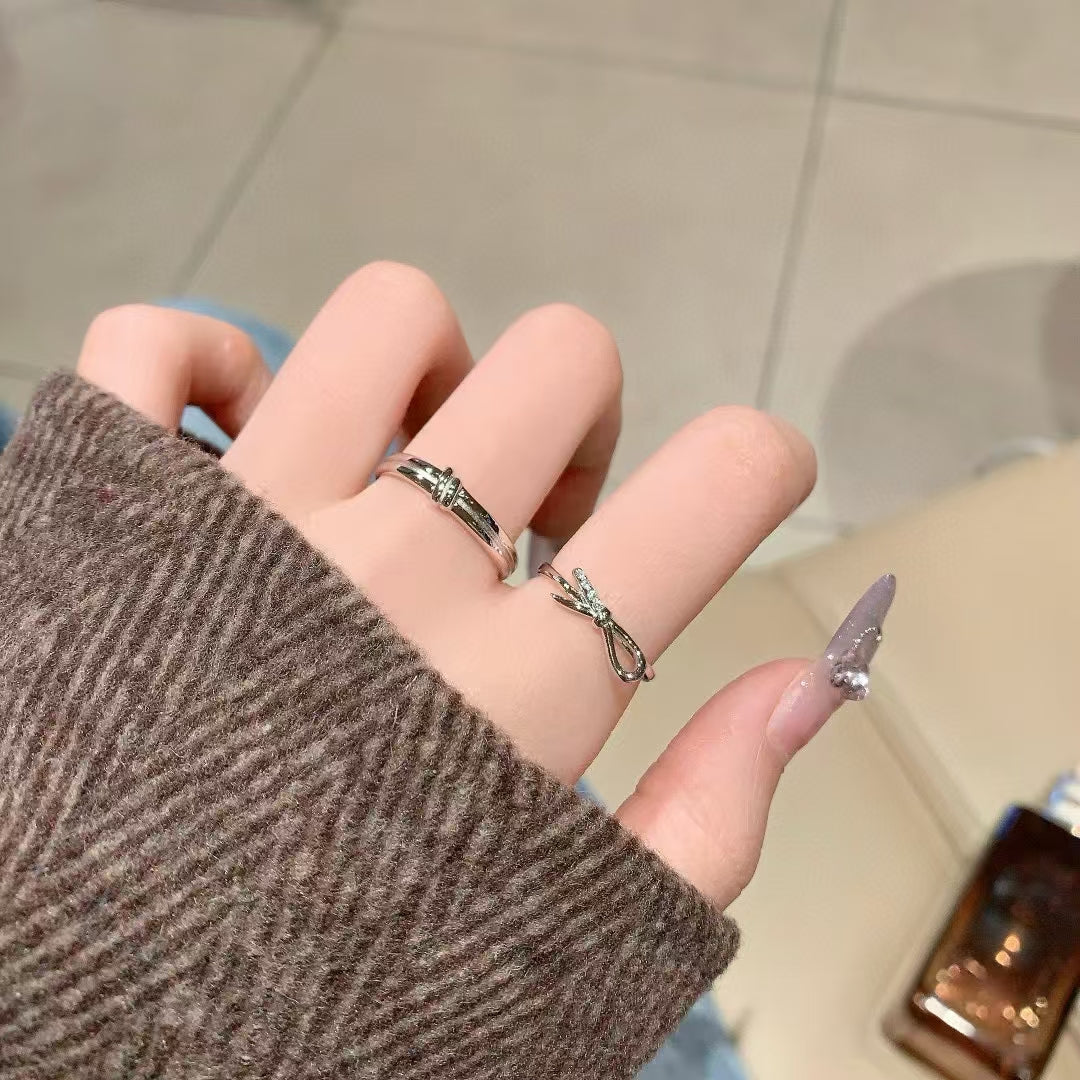 Tied with Devotion: Artisan Sterling Silver Bow Couple Rings with Sparkling CZ 2 pieces