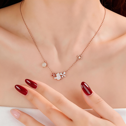 Whimsical Garden: Kitten & Peach Blossom Necklace with Golden Butterfly Detail