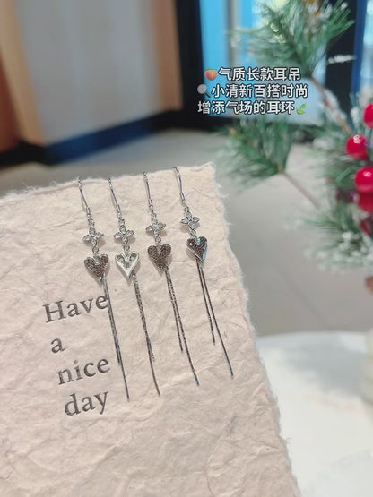 Amour Galactique : Boucles d'oreilles cœur céleste en argent 925 faites à la main avec zircones et pompons 