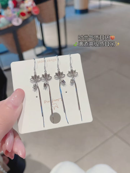 Fleur sacrée : Boucles d'oreilles à pampilles en argent 925, fabriquées à la main – L'illumination en mouvement