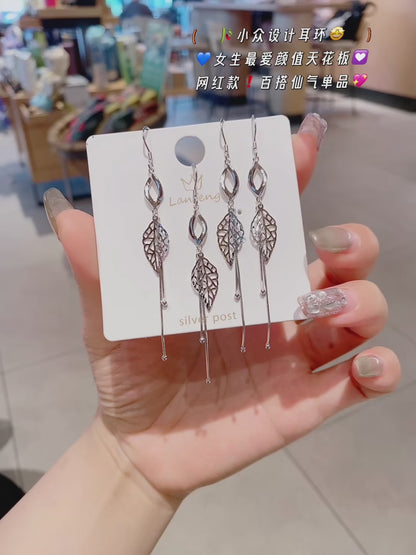 Boucles d'oreilles en argent sterling, feuilles et pampilles, fabriquées à la main – L'élégance de la nature, la touche artisanale