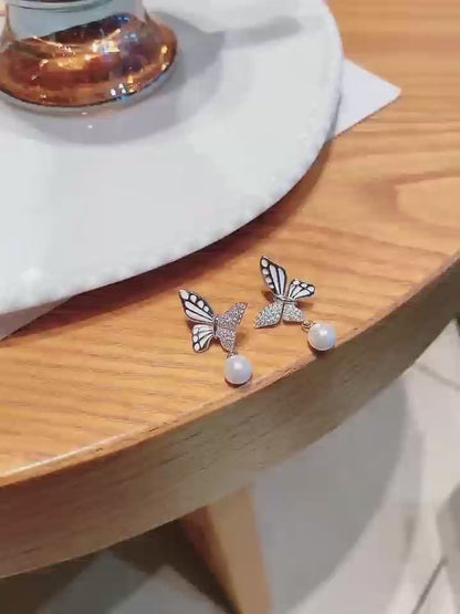 Liberty & Grace: Butterfly Pearl Earrings.This is such a great gift!